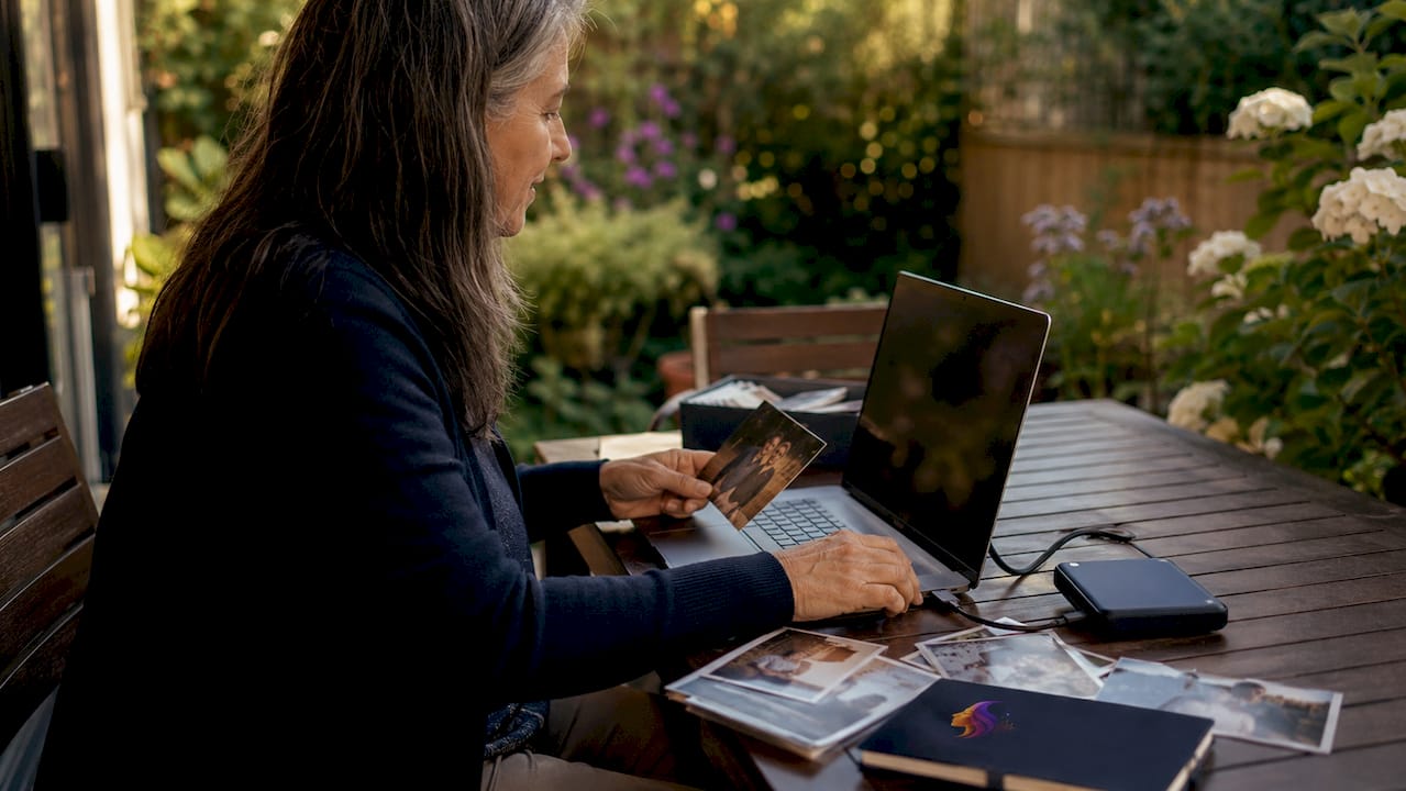 Person organizing family digital memories